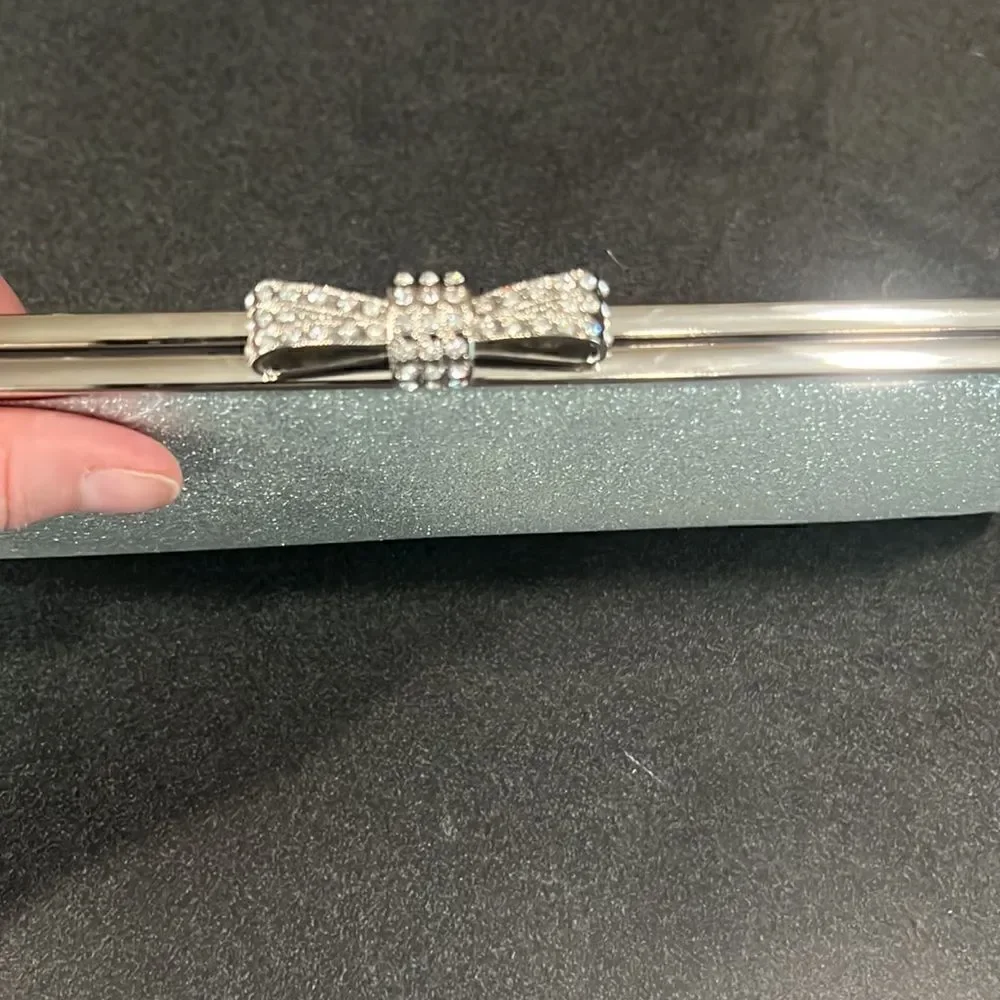 NWOT INC International Concepts Silver Sparkly Bowed Clutch